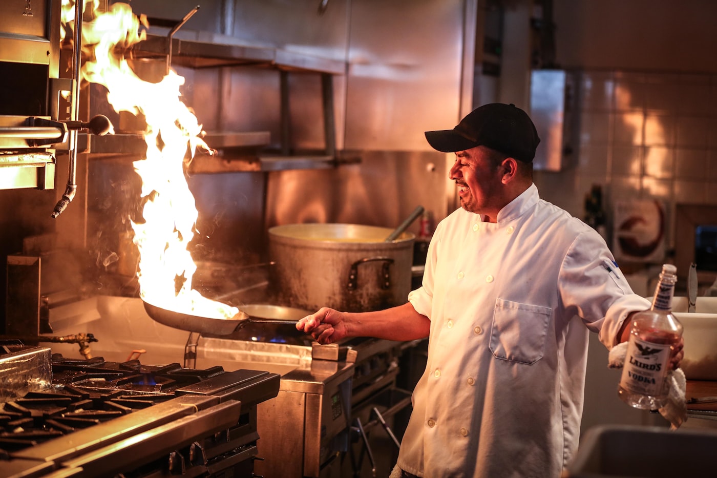 Chef plating food for a private dinner